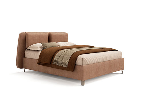 cama textil rosa palo con sabanas blancas y una manta roja encima