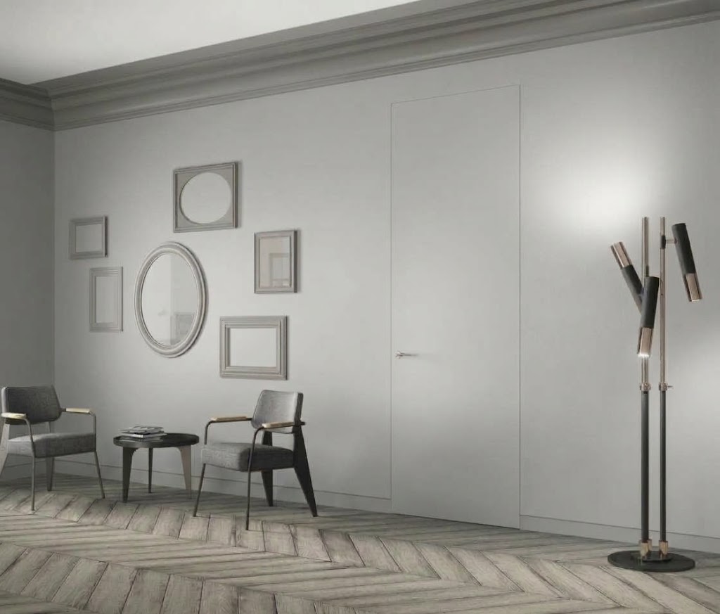 puerta oculta lacada NCS en una sala con suleo en madera natural